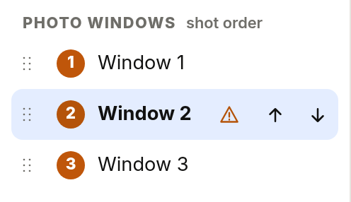 The Layers list: Window 2 is selected and has a warning triangle next to its name.